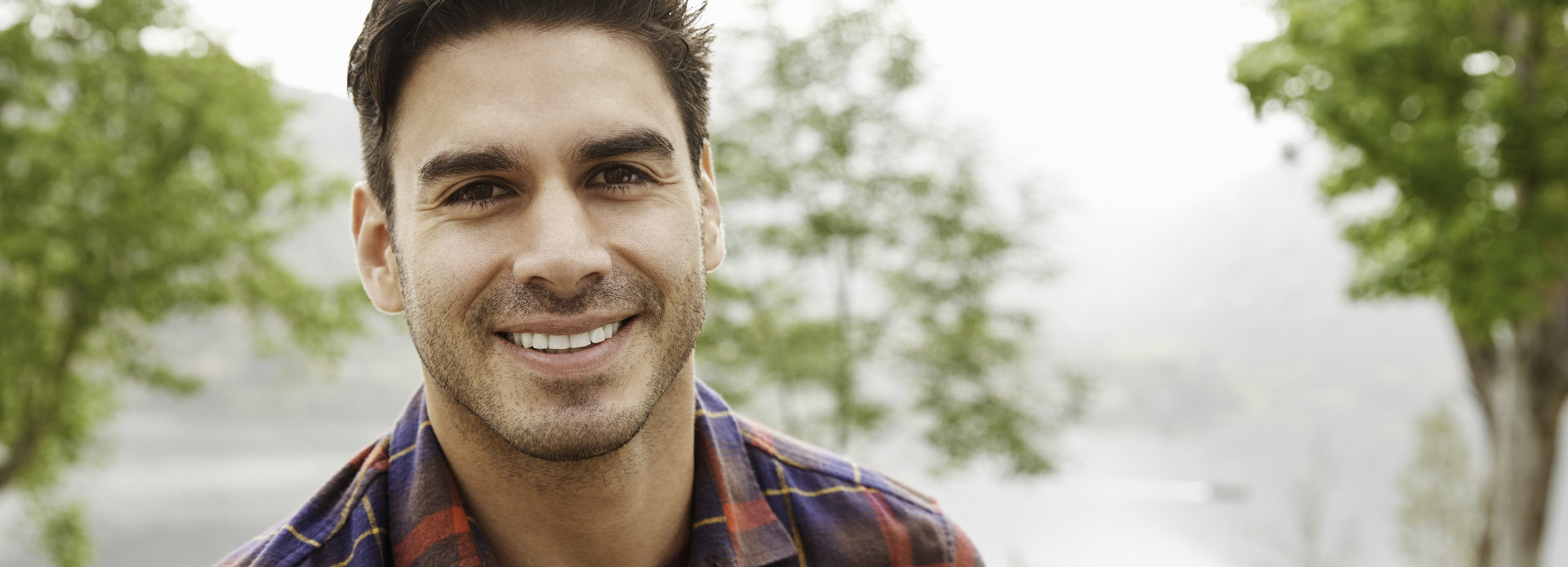 Young man with perfect smile after dental cosmetic treatment, Marietta GA