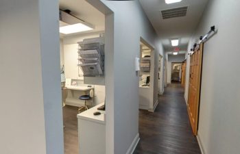 A view of a hallway in a dental office.