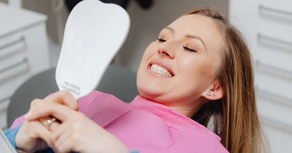 Happy patient enjoying safe sensitive teeth whitening treatment in Marietta