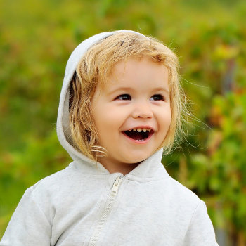 Pediatric Dentistry  Marietta child laughing in dental care visit
