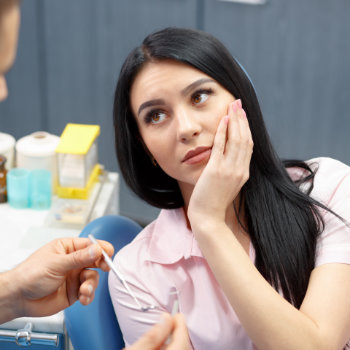 Dental visit woman in chair Marietta Dental Professionals care