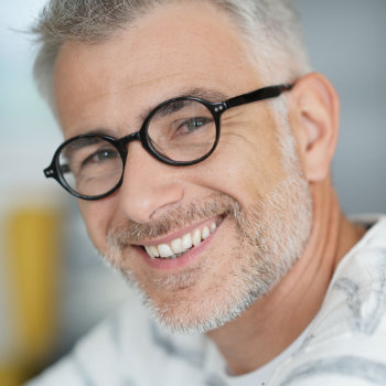 Handsome mature man with glasses Marietta Dental Professionals care