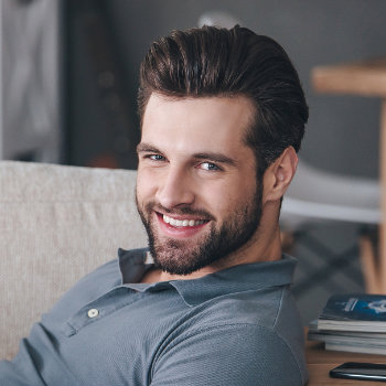 Smiling handsome businessman Marietta Dental Professionals patient