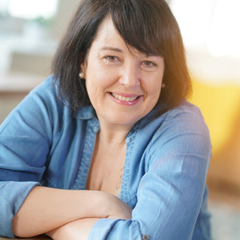 Mature brunette woman smiling Marietta Dental Professionals care