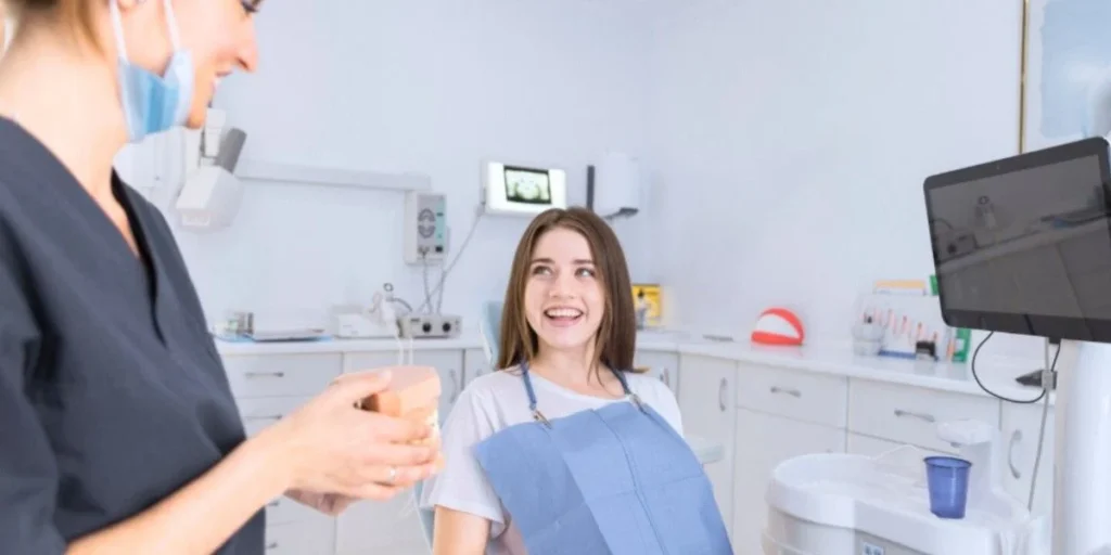Patient smiling during dental visit with Dentist Membership Plan Marietta benefits