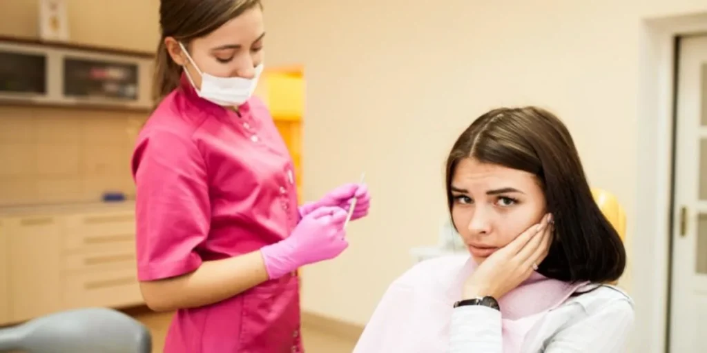 Patient seeking urgent dental emergency treatment in clinic