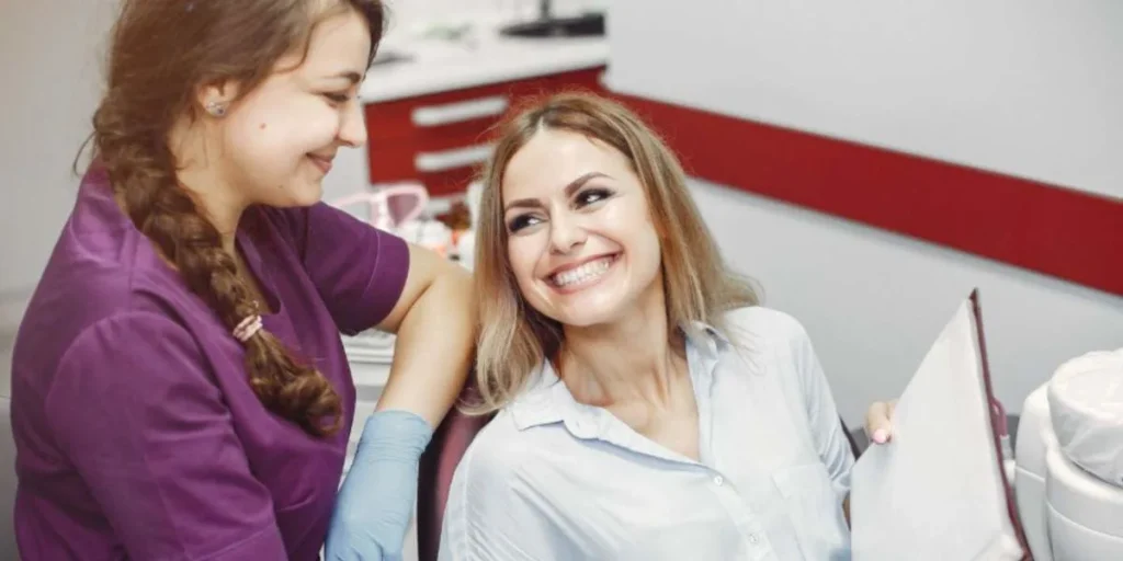 Patient smiling after successful dental emergency treatment