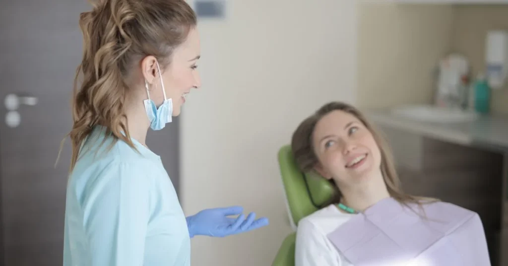 Dentist discussing restorative treatment with patient